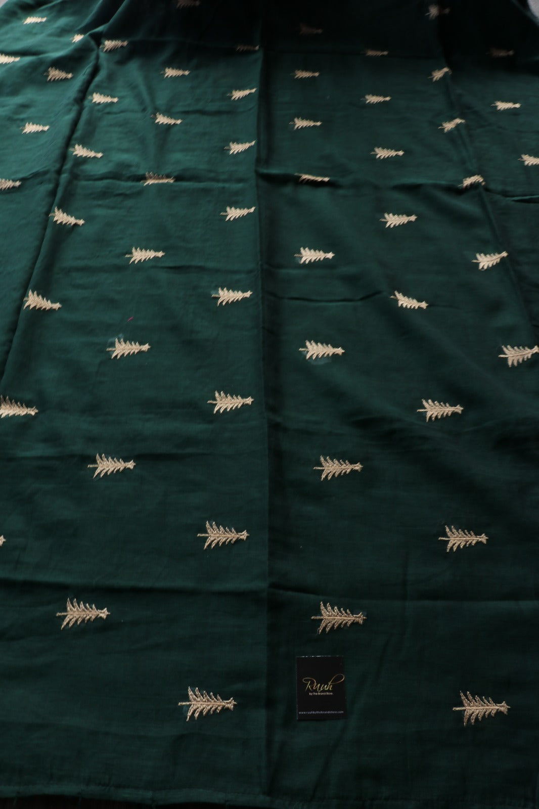 DARK GREEN MULMUL SAREE WITH PINE TREE EMBROIDERY