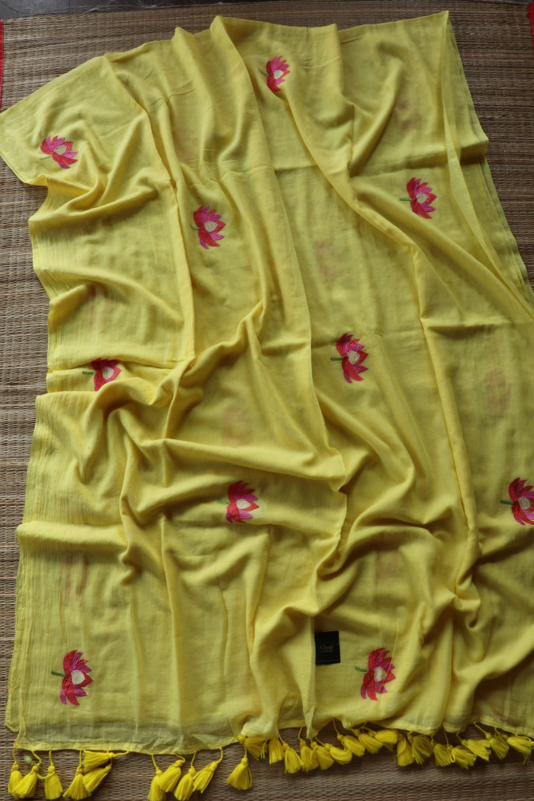 YELLOW  MULMUL SAREE WITH LOTUS EMBROIDERY