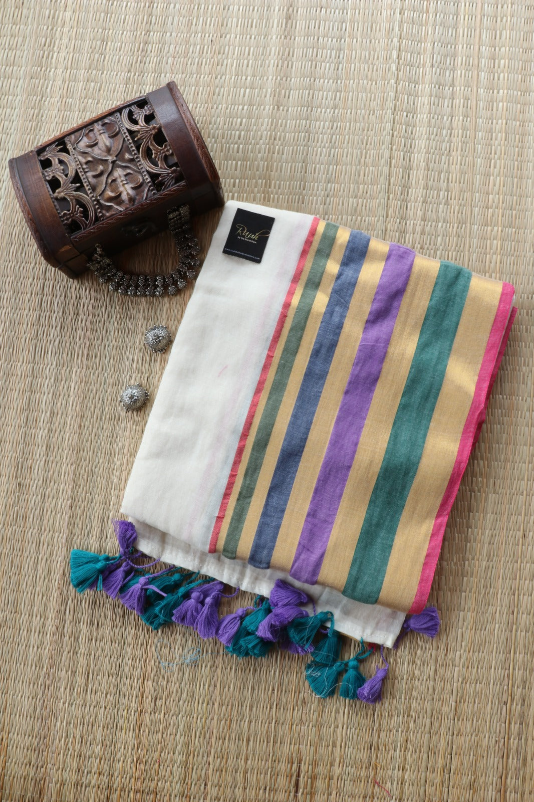 OFF WHITE MULMUL SAREE WITH MULTICOLOUR BORDER