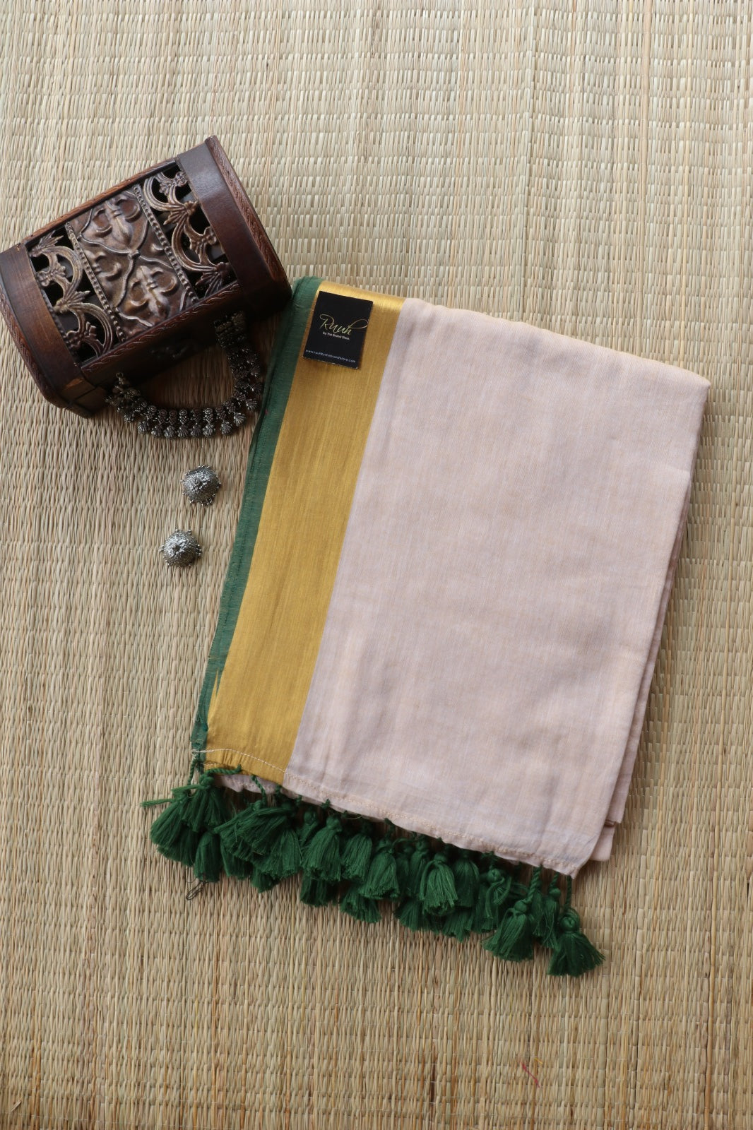 BEIGE MULMUL SAREE WITH GREEN EDGING