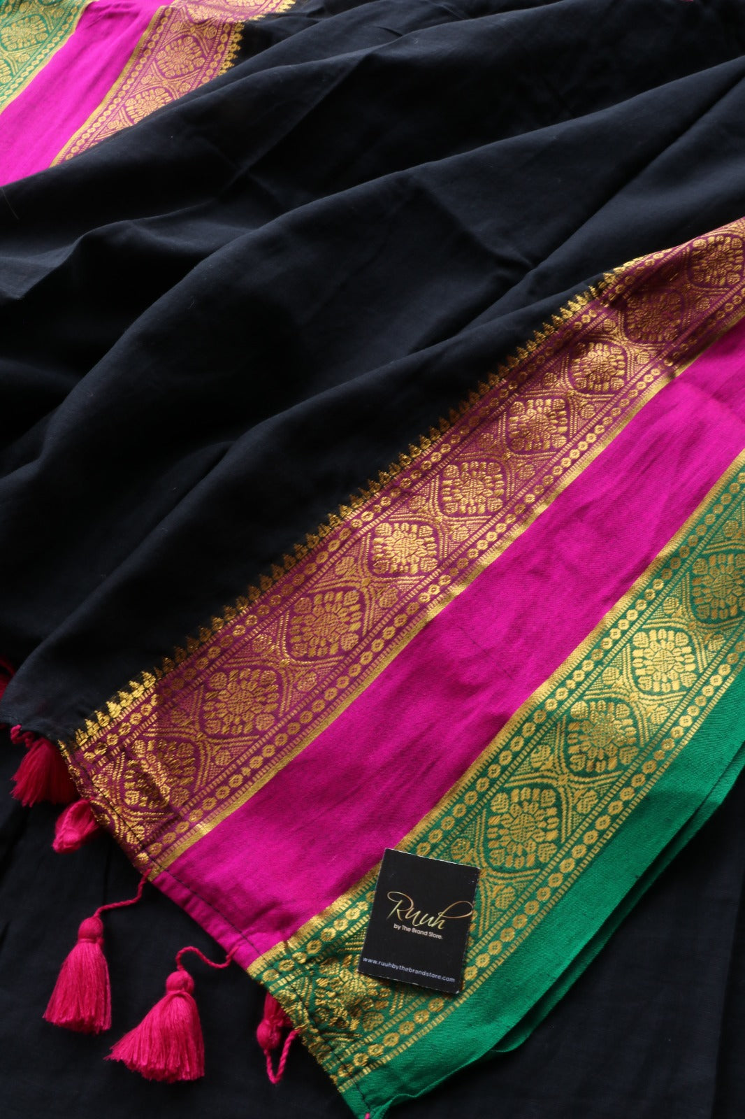 BLACK MULMUL SAREE WITH MULTICOLOUR BORDER