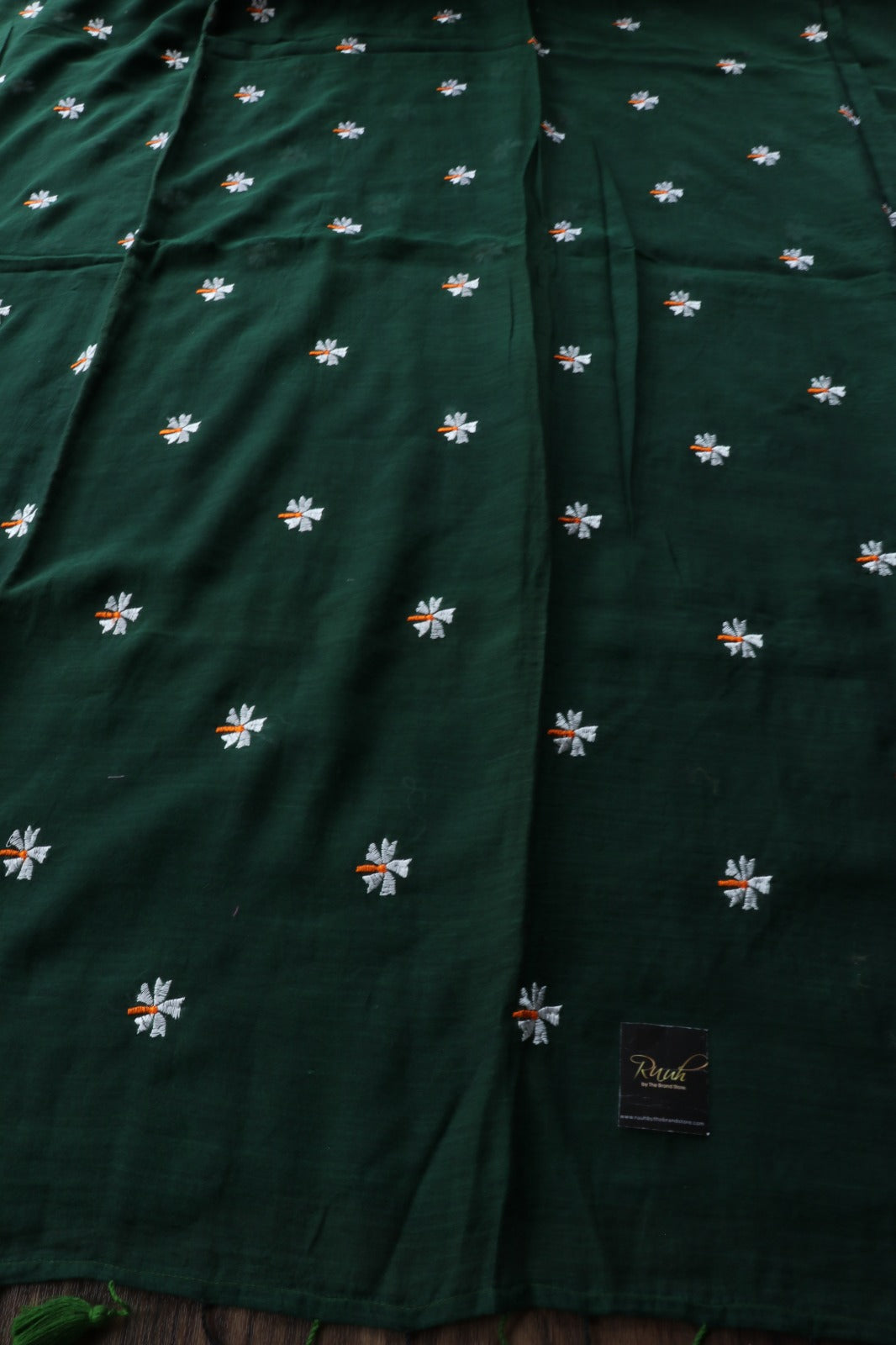 GREEN MULMUL SAREE WITH PARIJAT EMBROIDERY