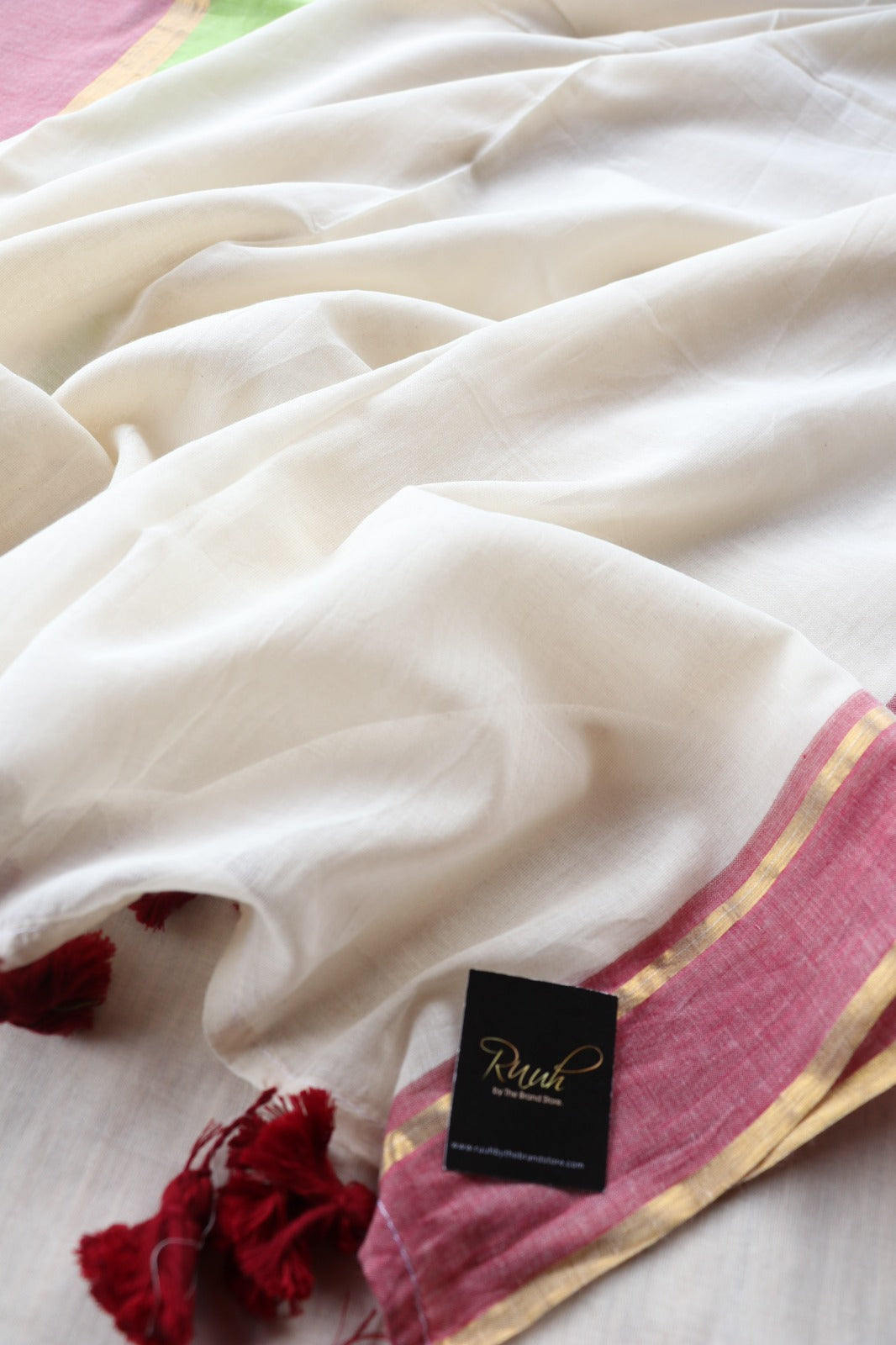 MULMUL SAREE WITH GREEN AND PINK BORDER