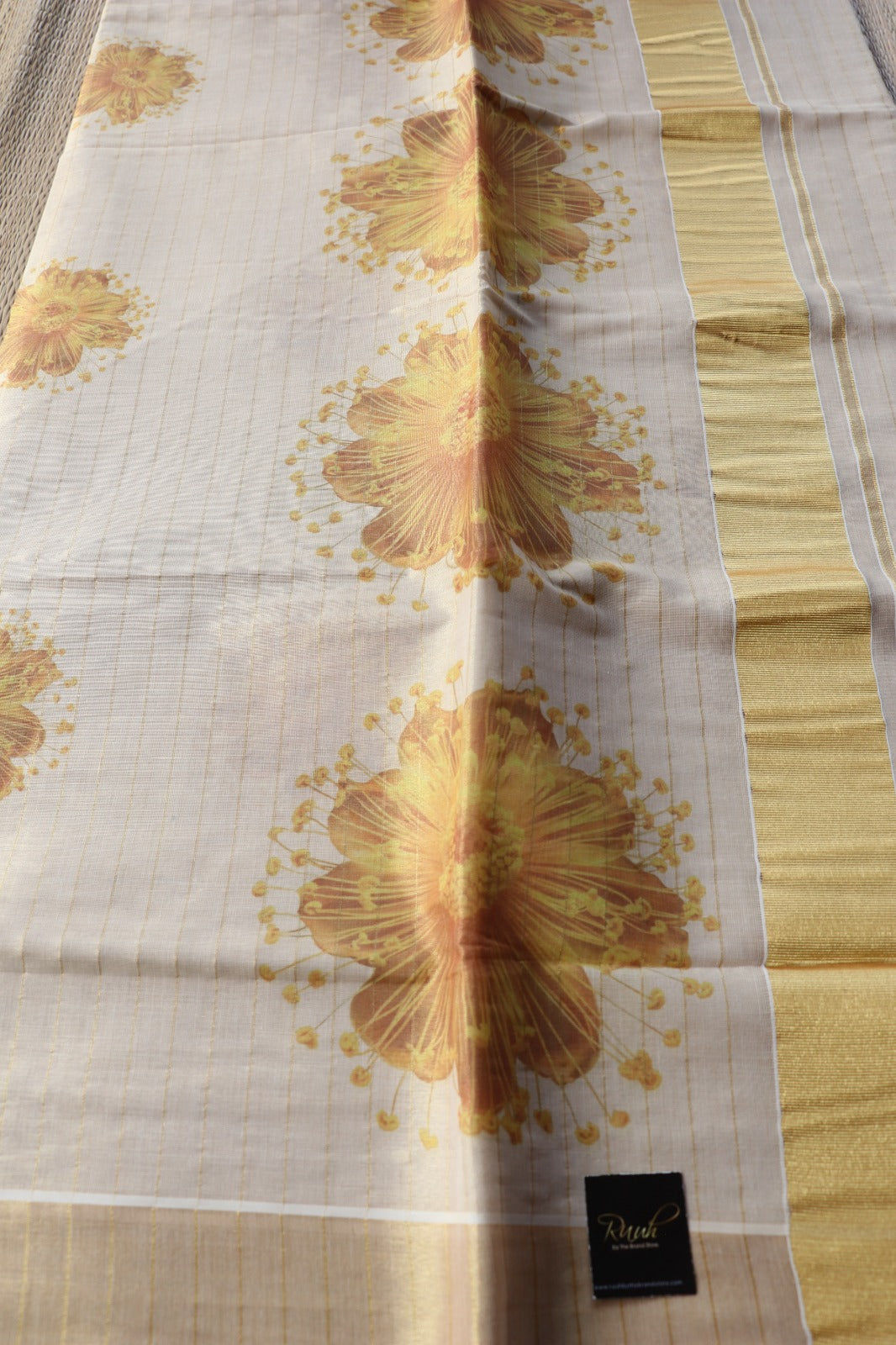 YELLOW FLORAL PRINTED KERALA TISSUE SAREE