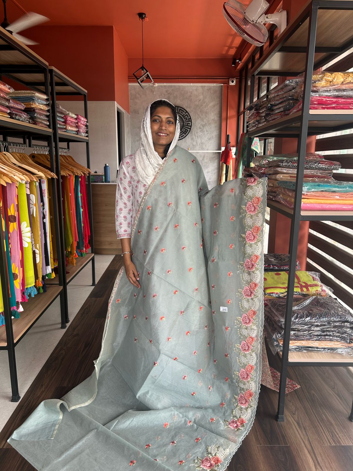 BLUE NET KOTA SAREE WITH FLORAL EMBROIDERY AND CUTWORK