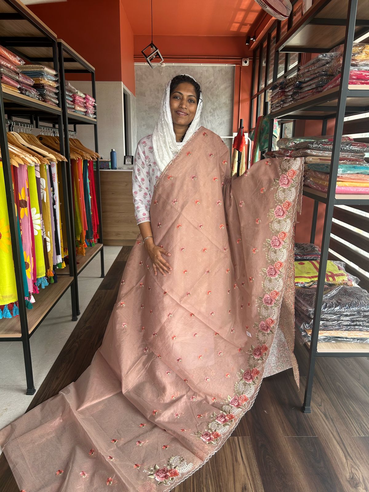 ONION PINK NET KOTA SAREE WITH FLORAL EMBROIDERY AND CUTWORK
