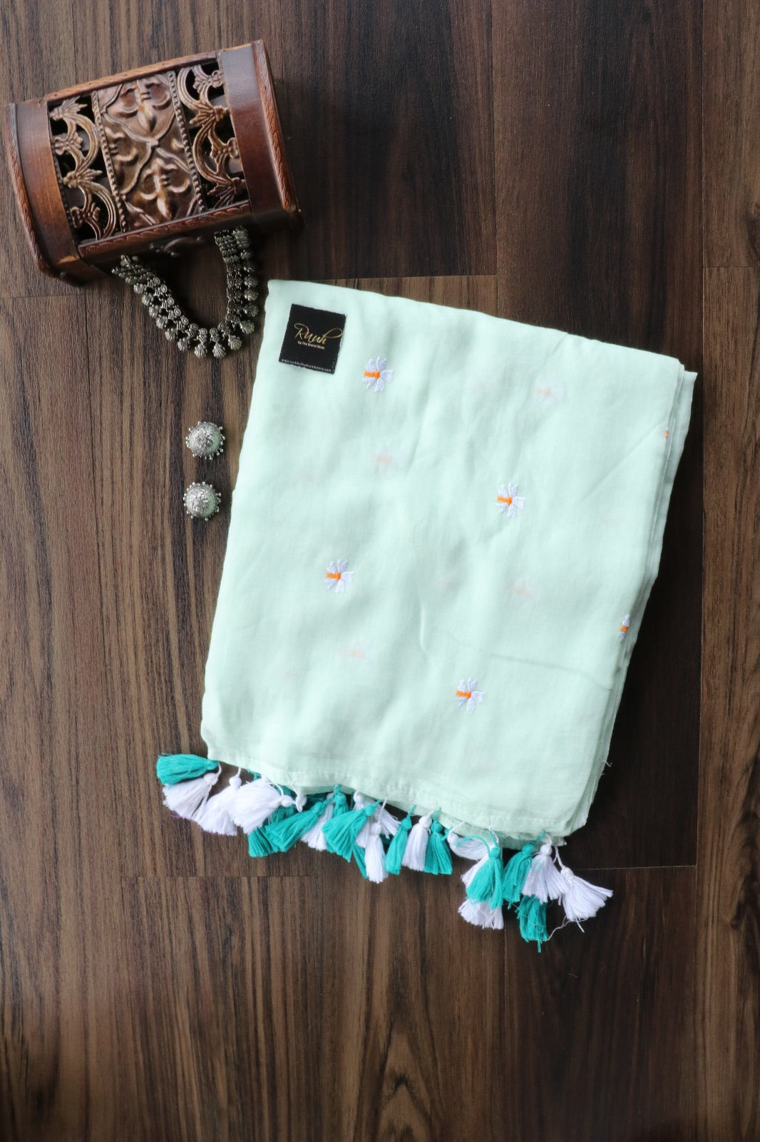 LIGHT PISTA GREEN MULMUL PARIJAT EMBOIDERY