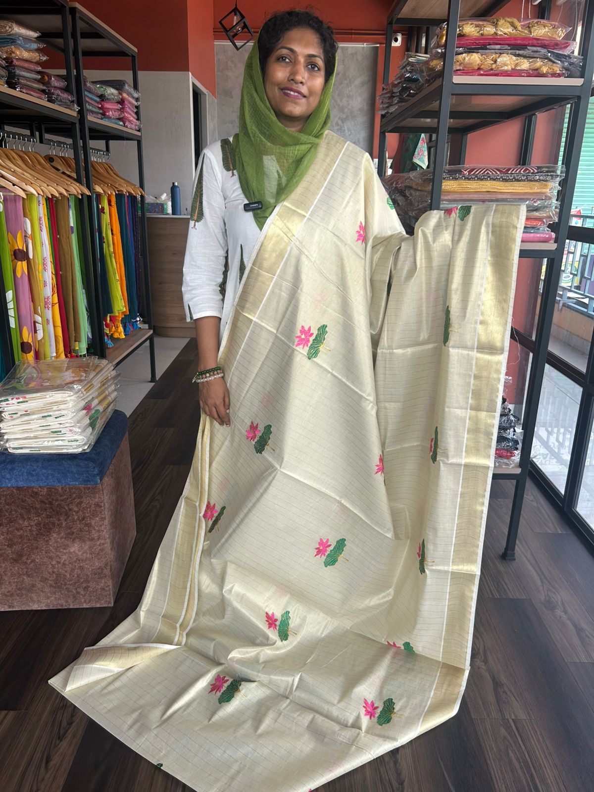 LOTUS EMBROIDERY ON KERALA TISSUE SAREE