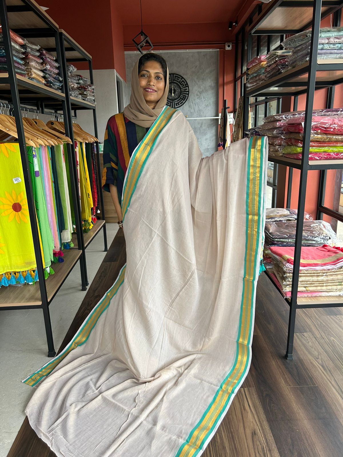 MULMUL SAREE WITH SEA GREEN AND GOLD BORDER